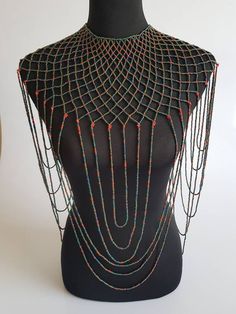 "This shoulder necklace is 100% handmade. Perfect for weddings , African themed events, cultural events or any other event. The list is endless.... Size; 22\" long for the longest strand. 16\" around the neck. **Buy multiple items and pay shipping for 1 item only.The rest ships free. More neckleces here; https://www.etsy.com/shop/TribalTess?ref=seller-platform-mcnav&section_id=21306083 Back to my shop; https://www.etsy.com/shop/TribalTess?ref=seller-platform-mcnav" Shell Shoulder Necklace, Bead Shoulder Necklace, Beaded Multi-strand Bib Necklaces For Parties, Afrocentric Necklaces, Black African Necklace, African Beads Necklace, Shoulder Necklace, Burlesque Costume, Cultural Events