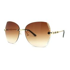 Definite retro trend, 90s oversize European fashion sunglasses. Luxurious rich rimless butterfly style shade that will give you the OG diva look! Made with a premium metal base frame with luxurious rimless exposed rhinestone decorative beveled lens setting. They will impeccably protect your vision with retro swag with 100% UV400 polycarbonate lenses. (b331) Size: 5 11/16" (143mm) x 2 1/4" (57mm).  Color: Gold.  Gender: female.  Age Group: adult. Butterfly Rhinestone, Butterfly Style, Rimless Sunglasses, Diva Fashion, Gold Sunglasses, Metal Base, Brown Gold, European Fashion, Fashion Sunglasses