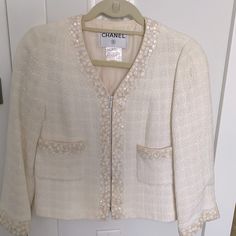 Authentic Vintage Chanel Ivory Blazer With Beautiful Detail. From 99p Collection. Arm Length. Silk Interior Lining. Size 42. But I Would Say Fits More Like A 38/40. Practically Brand New Condition. No Stains, Rips, Pull, Or Smells. A True Unique And Beautiful Piece! Designer White Spring Blazer, Designer White Blazer For Spring, White Designer Blazer For Spring, Designer White Blazer For Fall, Designer White Evening Blazer, Luxury White Blazer For Spring, Designer Cream Blazer For Spring, Luxury Cream Outerwear For Evening, Designer White Wedding Blazer