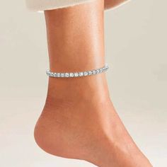 Oozing with cz diamonds, this Sparkling Tennis Anklet has a sophisticated & elegant design that is certain to draw attention. Made with crystal tennis chain design, durable clasp & set with sparkling cz diamonds. Now available in gold & silver. Definitely one of a kind piece that exudes endless energy & sparkly happiness. Elegant Silver Anklets With Bling, Elegant Silver Bling Anklets, Elegant Crystal Anklets With Adjustable Fit, Adjustable Crystal Anklets In Elegant Style, Elegant Cubic Zirconia Anklets, Diamond Rhinestone Tennis Bracelet As A Gift, Rhinestone Tennis Bracelet As Gift, Diamond Tennis Bracelet With Rhinestones For Gift, Diamond Tennis Bracelet With Rhinestones As Gift