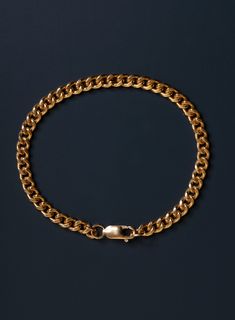 Sleek, minimalist 14k Gold Filled Cuban Chain Bracelet for Men. Select your size from drop down menu. Material: 14k Gold Filled Bracelet Width: 5mm Clasp: Lobster Claw Available in 7, 8, 9 inches. Gold-plated Cuban Link Chain Bracelet, Gold Plated Cuban Link Bracelets, Tarnish Resistant, Elegant Gold-plated Cuban Link Bracelet With Adjustable Chain, Luxury Gold-plated Cuban Link Bracelet, 14k Gold Cuban Link Bracelet, Tarnish Resistant, Cuban Chain Bracelet, Stainless Bracelet, Mens Gold Jewelry, Bracelet For Men