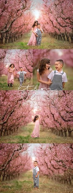 two people standing in front of some pink trees