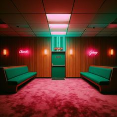 a room with two green couches and a neon sign