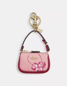 NWT Coach Mini Nolita Bag Charm With Cherry Print CR496 | eBay Designer Coated Canvas Bag With Zipper Pocket, Coach Coated Canvas Bag With Zipper Pocket, Coated Canvas Pouch Bag With Zipper, Coated Canvas Pouch Bag With Zipper Closure, Coated Canvas Pouch With Zipper Closure, Coach Leather Bags For Spring, Trendy Coated Canvas Bags With Zipper Closure, Spring Canvas Bag With Zipper Pocket, Spring Crossbody Bag In Coated Canvas