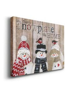 three snowmen are standing in front of a wooden sign