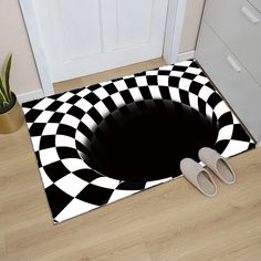 a black and white checkered door mat with a skull in the center on it