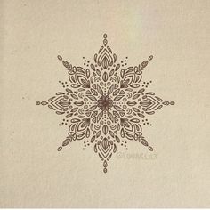 a snowflake is shown on a piece of paper