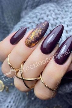 Purple and Gold Nails that Make a Statement exude an air of opulence and allure, combining the richness of deep purple with the lustrous sheen of gold accents to create a striking and luxurious manicure. #NailArt #PurpleNails #GoldAccents #StatementNails #ElegantDesign #LuxuriousManicure #MajesticNailArt #GlamourandGrace #NailInspiration #NailGoals Late Fall Nail Designs, Fall Almond Acrylic Nails, Almond Shaped Nails Designs Fall, Autumn Nails Almond Shape, Purple Almond Nails Design, Purple Autumn Nails, Almond Nails Fall Colors, Almond Nails Autumn, Fall Purple Nails