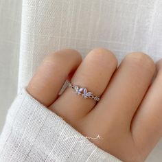 SIZE 6 The ultimate BFF ring, adorned with twin butterflies in gorgeous shades of lavender purple and pastel pink. This ring, complete with sparkling gems, will become you and your bestie's go-to favorite. MATERIALS: Cubic zirconia Gold, Rose Gold, Rhodium Plated, Brass Hypoallergenic (Nickel-free) Follow us on INSTAGRAM @statementgrey Dainty Butterfly Ring For Wedding, Silver Ring With Butterfly Charm For Wedding, Adjustable Elegant Rings With Butterfly Charm, Delicate Adjustable Butterfly Ring For Anniversary, Delicate Butterfly Ring For Promise, Delicate Butterfly Promise Ring, Adjustable White Butterfly Ring For Anniversary, Dainty White Gold Butterfly Ring For Wedding, Elegant Rings With Butterfly Charm For Gift