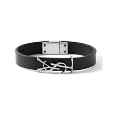 SAINT LAURENT's slim 'Opyum' bracelet has been made in Italy from leather and threaded with a silver 'YSL' logo plaque. It's equipped with a magnetic fastening, so you'll be able to get it on and off with one hand. Saint Laurent Accessories, Saint Laurent Jewelry, Saint Laurent Bracelet, Luxury Black Sterling Silver Bracelet For Men, Saint Laurent Necklace Silver, Latest Fashion, Bracelets For Men, Fashion News, Silver Tone