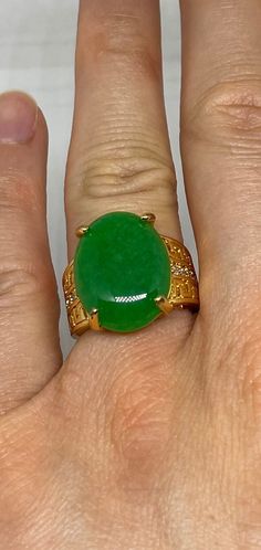 "Vintage Lucky Green Nephrite Jade ring Large green nephrite jade  Ornate gold finished White bronze Vintage ring, does not tarnish, NOT sterling Size 6.5,or  7 ONLY  My jeweler can custom re size for a $20 fee  All rings are shipped free in the US in a nice gift box.   Check out our over a THOUSAND great reviews Engraving is $4 per letter and is not always perfect depending on the piece. It can take a few days if the jeweler is busy. This is payable to Paypal Judithsltd@gmail.com This is \"fun Green Signet Ring With Oval Cabochon Gemstone, Green Oval Cabochon Signet Ring, Green Oval Cabochon Gemstone Signet Ring, Green Oval Cabochon Signet Ring For Gift, Green Oval Cabochon Signet Ring As Gift, Jade And Gold Jewelry, Gold Oval Chrysoprase Emerald Ring, Spiritual Green Open Ring, Gold Jade Cabochon Rings