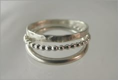 Set of 3 Sterling Silver Rings for women. They are beaded, hammered and smooth. These stacking rings will be send in a jewelry-bag. More rings in our shop: https://www.etsy.com/de/shop/RomeoUndJuliaGermany?ref=l2-shop-header-avatar&section_id=23705031 Stacker Rings, Sterling Silver Jewelry Rings, Silver Rings With Stones, Sterling Silver Stacking Rings, Soldering Jewelry, Jewellery Unique, Silver Ring Set, Jewels Rings, Silver Jewelry Handmade