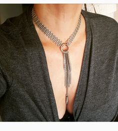 "♦ A beautiful wide choker, made of silver-plated brass in a very high quality with a large O-Ring in its center and tusk pendant. Size Length: 11.8\" (30cm) up to 17.7\"(45cm) pendant height: 1.37\" (3.5cm) width choker: 0.78\" (2 cm) ♦ This piece of jewelry is perfect as a gift for yourself, for a wedding day, Valentine's day or a birthday. If you're interested in sending a gift to a third party, just write your message to the recipient and i will do so with joy. ♦ The jewel will be sent by re Silver Dangle Chain Choker, Bohemian Silver Clavicle Chain Choker, Silver Lariat Choker Necklace With Clavicle Chain, Silver Lariat Jewelry, Silver Lariat Necklace With Adjustable Chain, Metal Lariat Choker Necklace, Rocker Jewelry, Tusk Pendant, Toggle Necklace