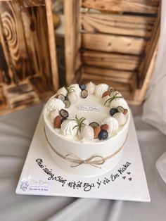 a white cake sitting on top of a table