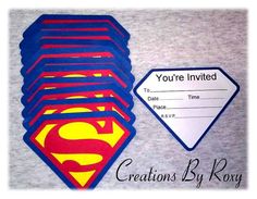 a superman themed birthday party with a super hero shirt and envelope for the child's name