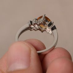 This is a gorgeous handmade creation. Its beauty is its simplicity & Elegance. The 7*7 mm cushion shape faceted natural citrine is crafted in solid sterling silver and with rhodium plated. All item is sent in a beautiful gift box If you have any idea of design your ring,pls contact me directly. You can realize more lovely stuff clicking the link https://www.etsy.com/shop/knightjewelry?refshopsection_shophome_leftnav Please leave the correct address and you phone number for delivering success Citrine Cushion Cut Jewelry For Anniversary, Amber Topaz Ring In Sterling Silver For Promise, Amber Topaz Sterling Silver Promise Ring, Silver Citrine Topaz Ring With Prong Setting, Citrine Topaz Promise Ring, Polished Topaz Jewelry For Weddings, White Gold Citrine Rings With Diamond Cut, Formal Citrine Cushion Cut Ring, Wedding Amber Topaz Ring In Sterling Silver