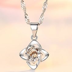 "925 Sterling Silver Crystal Zircon Four Leaf Pendant Necklace For Woman, K139 "" Available Size:18 Inch Metal: 925 Sterling Silver Stone: Cubic Zirconia 100 % Lead And Nickel Free 100 % Hypoallergenic Will Not Tarnish Or Fade Perfect For Gift, Holiday, Christmas, Birthday, Vacation, Mother's Day, Valentine's Day, Wedding, Engagement , Bridal, Promise, Anniversary, Party Item Code: N014 Thank You For Shopping With Us!""" Sterling Silver Diamond Necklace Fine Jewelry, White Diamond Flower Pendant Necklace In Sterling Silver, Silver Crystal Flower Pendant Jewelry, Silver Cubic Zirconia Flower Pendant Jewelry, Silver Cubic Zirconia Flower Pendant, White Diamond Necklace In Sterling Silver, Sterling Silver Necklace With Diamond White Flower Pendant, Luxury Sterling Silver Flower Pendant Jewelry, Silver Sterling Silver Diamond Necklace With Round Pendant