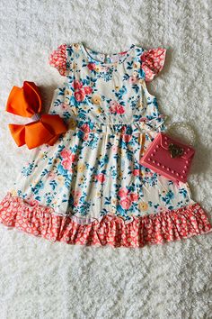 XCH0555-19H Floral printed short sleeve girls swirl dress w/ruffle trim Size chart XXS 6-12MXS 12-18MS 2TM 3TLRG 4TXL 5-6YXXL-6-7YXXXL 7-8