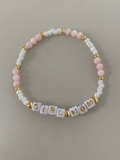 -baby pink and gold combination bracelet. -Personalize what you would like the letters to say! -One bracelet sold for each order. Order more bracelets to stack! Check out the other designs we include! -Gold beads are made with 14k gold plated beads. -Each bracelet comes with a sunset stamped charm If you have a color combination you would like that you don't see, message me and we can see if I can fulfill the request based on materials! Cheap Pink Bracelets With Custom Name, Cheap Adjustable Pink Name Bracelet, Trendy Pink Beaded Bracelets With Letter Print, Name Bracelet With Letter Print As Gift, Adjustable Pink Jewelry With Letter Print, Customizable Pink Bracelet Jewelry, Trendy Pink Bracelets With Letter Print, Trendy Pink Letter Print Bracelets, Pink Beaded Name Bracelet For Birthday