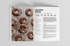 an open book with chocolate donuts and sprinkles on the inside pages