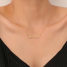 Introducing our exquisite gold name necklace, a stunning piece of customized jewelry that is sure to become a beloved and cherished accessory. Crafted from high-quality 14K gold, this necklace boasts a delicate chain adorned with a personalized pendant displaying your chosen name in elegant script. The pendant itself is meticulously handcrafted to ensure precision and attention to detail. Its beautiful cursive letters are gracefully intertwined, creating a timeless and sophisticated look. Whether it's your own name or the name of a loved one, this necklace is a heartfelt and meaningful way to commemorate a special bond or celebrate your own individuality... The adjustable chain allows for a perfect fit, ensuring comfort and versatility. Wear this necklace as a daily reminder of love, empow Pendant Name Necklace For Anniversary Gift, Customizable Pendant Necklaces For Anniversary, Customizable Pendant Necklace For Anniversary, Elegant Customized Necklaces For Anniversary Gift, Elegant Customized Necklace For Anniversary Gift, Elegant Customizable Necklace For Anniversary Gift, Elegant Customizable Necklace For Anniversary, Elegant Customized Charm Necklaces For Valentine's Day, Custom Name Pendant Necklace For Anniversary