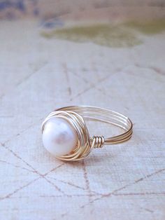 Freshwater Pearl Ring - Made to order - Summer Indigo Pearl And Wire Jewelry, Wire Pearl Ring, Wire Wrapped Pearl Wedding Ring, White Wire Wrapped Pearl Ring For Wedding, Wire Jewelry Ideas, Diy Pearl Rings, Handmade Wire Rings, Wire Wrapped Jewelry Rings, Indigo Jewelry