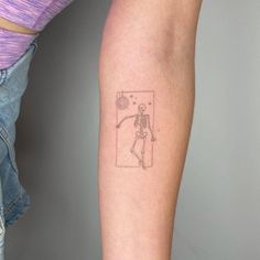 a person with a tattoo on their arm