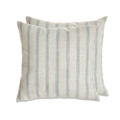 two blue and white striped pillows on a white background, one is made out of linen