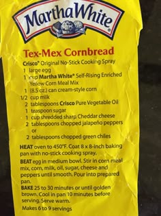 a yellow sign with instructions for tex - mex cornbread