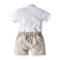 You can never go wrong when you dress your little one in this adorable Boy Waistcoat & Shorts Set. This cute outfit includes a khaki linen waistcoat and shorts and a white shirt, and is topped off with an adorable black bowtie. Style it with hat and matching shoes to complete the set. Material: Cotton Summer Beige Sets With Pockets, Beige Cotton Short Sets, Beige Summer Sets With Pockets, Beige Tie-waist Shorts, Linen Waistcoat, Boys Waistcoat, Black Bowtie, Matching Shoes, Cute Outfit