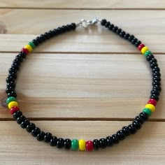 Rasta Style Beaded Anklet Colorful Anklet Seed Bead Anklet | Etsy Multicolor Beaded Bracelets With Black Beads For Beach, Black Beaded Bracelets For The Beach, Casual Multicolor Beaded Anklets, Casual Multicolor Round Beads Anklets, Multicolor Round Bead Anklets For Beach, Multicolor Round Beads Anklets For Beach, Multicolor Round Beaded Anklets For The Beach, Casual Multicolor Anklets With Tiny Beads, Casual Multicolor Tiny Beads Anklets