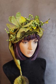 SIZING  Smalls fit up to a 21 inch head, average, dragonfly and short hats will fit average heads 22 to 23 inches.    These hats are made from a GORGEOUS mossy green velvet that has such a nice sheen to it. This hat reminds me of being in the Redwood Forest with the bright greens and rich browns. The brims are a short fur that is so ultra soft in that gorgeous green with bands of brown. The brims are cut generously so they can be cuffed down for added fullness.    There's one hat that has a crow Ranger Cosplay, Elf Ranger, Forest Nymph, Green Wing, Mossy Green, Redwood Forest, Scottish Plaid, Velvet Pumpkins, Green Forest