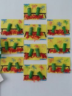 several pieces of construction paper are arranged in the shape of firecrackers and fireworks