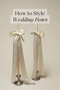 two white candles with bows on them and the words how to style wedding bors