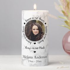 a personalized candle with a photo on it