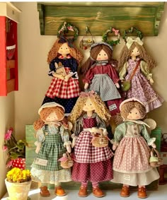 a group of dolls standing next to each other