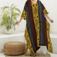 Stay cool and stylish with our Adinkra Print Women's Imitation Silk V-neck Kaftan Robe. Capture your memories in comfort and style with this must-have travel essential. Fabric: Imitation Silk(97% polyester and 3% spandex) Regular fit V-neck Fabric weight: 90g/m² Care Instruction: machine wash cold with similar colors, do not bleach, tumble dry low, do not iron, do not dry clean. Multicolor V-neck Kaftan With Batik Print, Traditional Multicolor V-neck Kimono, Bohemian Multicolor V-neck Thobe, Traditional Multicolor V-neck Maxi Dress, Yellow Printed V-neck Kaftan, Yellow Batik Print Beach Dress, Printed V-neck Free Size Kaftan, Yellow Bohemian V-neck Kimono, Casual Yellow V-neck Kaftan