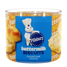 buttermilk biscuits in a glass container on a white background