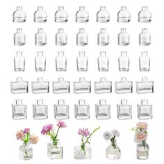 many vases with flowers in them are arranged on a white background and one is filled with water