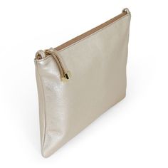 The largest of our organizational pieces, the Vale Pouch in Platinum is ideal for dropping in carry-ons and our larger handbags. A roomy size, we recommend it for an organizing piece or carry it on its own. Two interior slip pockets will ensure your essentials stay in place. The versatility of this classic zip pouch also makes it an ideal clutch for an evening out or add a strap to go hands-free. Chic Bags With Zipper Pouch For On-the-go, Elegant Zipper Pouch Bag For On-the-go, Minimalist Travel Clutch, Modern Everyday Pouch With Zipper Pocket, Minimalist Rectangular On-the-go Pouch, Versatile Everyday Pouch With Zipper Pocket, Minimalist Pouch Clutch For Everyday Use, Modern Clutch With Zipper For Daily Use, Modern Clutch With Zipper Closure For Daily Use