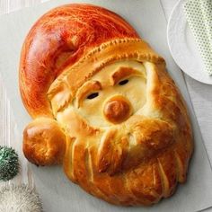 an apple shaped pastry with a face on it