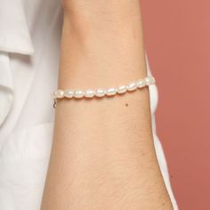 The Antonella Bracelet is a beautiful and timeless piece that exudes elegance and grace. This bracelet features a strand of lustrous freshwater pearls, each carefully selected for their unique shape and natural sheen. A delicate gold tag inscribed with the word "Love" adds a heartfelt touch. The adjustable clasp ensures a perfect fit, making it comfortable for all-day wear. Perfect for special occasions or adding a touch of sophistication to your everyday style, the Antonella Bracelet is a versatile and classic addition to any jewelry collection.  Details:   18k Gold Plated,length:19CM   FREE Insured Shipping (Worldwide)