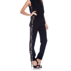 Its urban appeal makes the Victorya lace-detail jumpsuit a great option for go-anywhere style. Crewneck. Sleeveless. Overlay bodice with cutouts at back. Gathering at elasticized waistband. Lace panels at side seams. Straight leg. Full-length inseam, 32”. Self: Triacetate, Polyester crepe. Contrast: Viscose, Cotton, Nylon lace. Lining: Polyester georgette. Fitted Sleeveless Jumpsuit With Lace Trim, Fitted Sleeveless Jumpsuits And Rompers With Lace Trim, Night Out Lace Jumpsuits And Rompers With Lace Trim, Sleeveless Lace Trim Jumpsuit, Elegant Sleeveless Jumpsuits And Rompers With Lace Trim, Elegant Sleeveless Lace Trim Jumpsuits And Rompers, Elegant Sleeveless Lace Trim Jumpsuits, Sleeveless Lace Jumpsuits And Rompers For Party, Sleeveless Lace Jumpsuits For Party