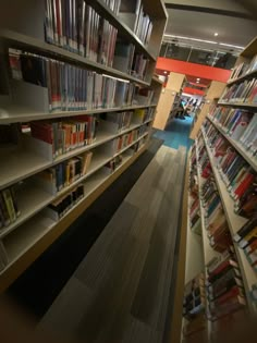 a library filled with lots of books on shelves