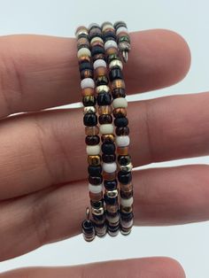 3 strand memory wire bracelet with earthy size 8 seed bead mix. Beaded Multi-strand Wrap Bracelet, Memory Wire Bracelet, Memory Wire Bracelets, Wire Bracelet, Memory Wire, Seed Bead, Arm Band, Seed Beads, Jewelry Bracelets