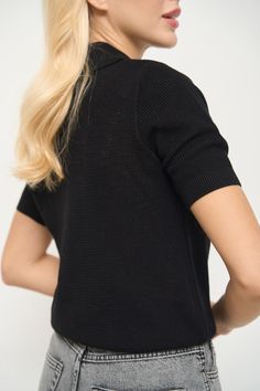 The basic T-Shirt with an original knitted texture and polo collar. It is made of incredibly soft and durable cotton-based material that stretches well and does not restrict movement. The lower cuff can be bent so the T-Shirt will fit high-waisted items. It looks great with jackets and can also be worn as a stand-alone top in warmer weather, complementing your spring and summer looks harmoniously. Textured Knit Collared Polo Shirt, Cotton V-neck Top With Ribbed Collar, Cotton Polo Shirt With Textured Knit Collar, Collared Polo Sweater In Textured Knit, Cotton Textured Knit Polo Shirt With Collared Neckline, Textured Knit Collared Polo Sweater, Cotton T-shirt With Ribbed Collar For Work, Fitted Cotton Polo Sweater For Work, Textured Knit Polo Shirt For Work