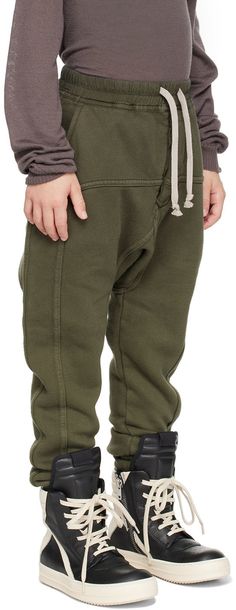 Organic cotton fleece lounge pants. · Drawstring at elasticized waistband · Four-pocket styling · Dropped inseam · Rib knit cuffs · Hand-wash Supplier color: Green Model measures 46 / 117 cm tall and wears size 6Y. Rick Owens Size: child's height 4Y: 40.9 / 104 cm 6Y: 45.7 / 116 cm 8Y: 50.4 / 128 cm 10Y: 55.1 / 140 cm 12Y: 59.8-60.6 / 152-154 cm Cozy Cotton Joggers With Drawstring, Green Cotton Sweatpants With Drawstring, Winter Cotton Joggers With Drawstring, Winter Cotton Sweatpants With Drawstring, Cozy Cotton Sweatpants With Drawstring, Comfy Cotton Joggers With Drawstring, Cozy Streetwear Pants With Pockets, Winter Cotton Bottoms With Drawstring, Fall Cotton Sweatpants With Drawstring