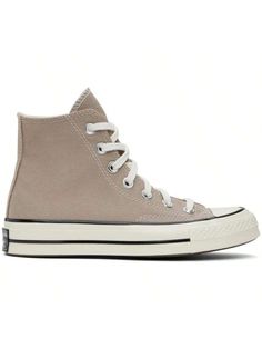 Converse 
Taupe Chuck 70 age Canvas Sneakers 
High-top 12 oz canvas sneakers in taupe. 
. Rubber cap toe 
. Lace-up closure 
. Logo patch at inner side 
. Eyelets at inner side 
. Cusned OrthoLite® footbed 
. Rubberized logo patch at heel 
. Treaded rubber sole 
. Contrast stitching in white 
Supplierlor: age cargo/Egret/Black 
Upper: textile. Sole: rubber. 
Made in Viet Nam. 
241799F127078 
Taupe Chuck 70 Age Canvas Sneakers default         Sports & Outdoor Shoes, size features are:Bust: ,Lengt Casual Athletic Shoes, Chuck 70, Womens Athletic Shoes, Outdoor Shoes, Canvas Sneakers, Outdoor Woman, Maternity Bag, Chuck Taylors, Kid Shoes