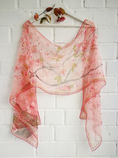 Luxury Hand painted Silk Chiffon scarf with flowering Cherry Tree branch in Warm Pink background. Lots of white and light pink cherry blossoms and little dark pink buds flowering in a spring time. Several olive green leaves and wind blown petals... Some accents in gold. All this beauty is framed with and double olive green and darker pink boarding. Very romantic, sweet, soft and cozy. ---------------------------------------------------------------------------------------------------------------- Summer Pink Floral Print Dupatta, Spring Floral Print Pink Dupatta, Pink Shawl Scarf For Spring, Pink Shawl Scarves For Spring, Pink Silk Shawl For Spring, Pink Floral Print Shawl Scarf, Elegant Pink Floral Print Dupatta, Pink Silk Shawl Scarf For Wedding, Pink Silk Shawl For Wedding