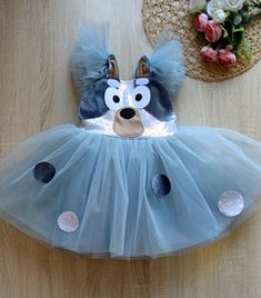 Muffin, Blue-y Inspired heeler dog dress, Blue Heeler dog Inspired Birthday party tulle dress, Kids cute halloween dog costume Kids Blue-y Bingo family Inspired  charater heeler Dog costume , halloween theme kids romper We make the best quality personalized Birthday party costumes  for your little Ones. The top is from a Gray sequin and velvet fabrics, super fluffy skirt is made from a soft tulle.. Cotton lining inside. The top of the dress decorated with a dog face . Your lil one will be so spe Halloween Dog Costume, Heeler Dog, Blue Heeler Dogs, Velvet Fabrics, Fluffy Skirt, Party Costumes, Rompers For Kids, Dog Dress, Halloween Dog